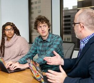 People discussing in meeting